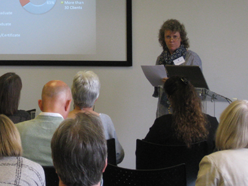 Linda Hammond delivering a presentation at a family history conference